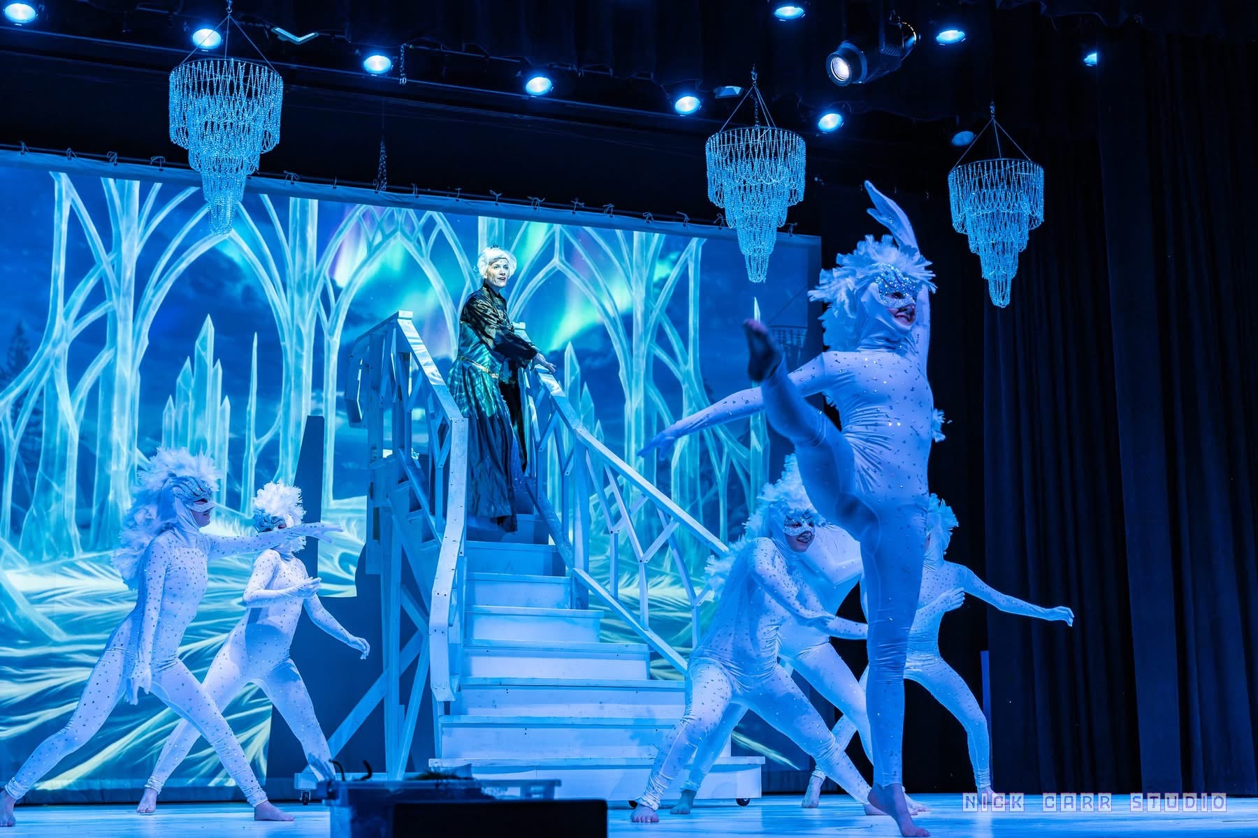 Elsa overlooking the snow chorus in Disney's Frozen